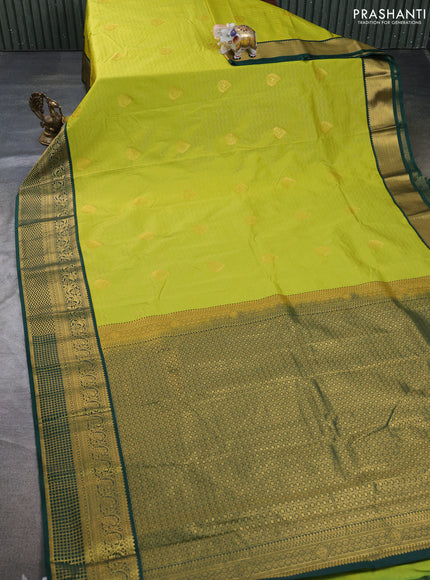 Semi kanchipuram silk saree light green and green with allover zari weaves & buttas and zari woven border