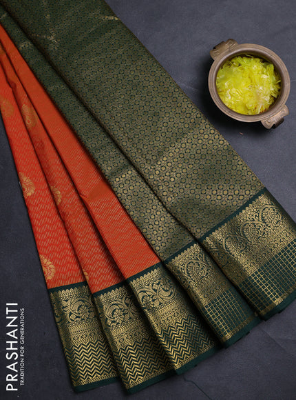 Semi kanchipuram silk saree orange and bottle green with allover zari weaves & buttas and zari woven border