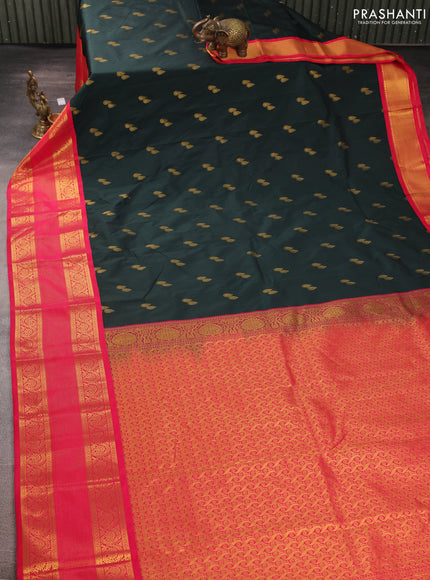 Semi kanchipuram silk saree bottle green and pink with allover zari woven buttas and long zari woven border