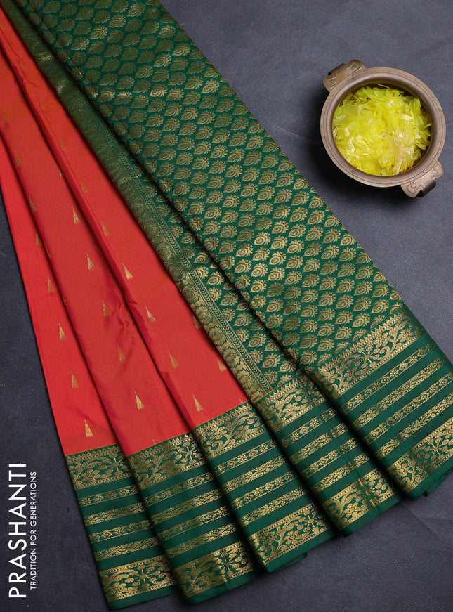 Semi kanchipuram silk saree orange and green with allover zari woven buttas and zari woven border