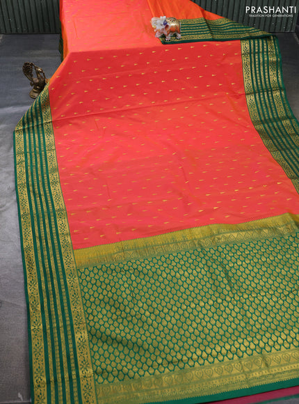 Semi kanchipuram silk saree orange and green with allover zari woven buttas and zari woven border