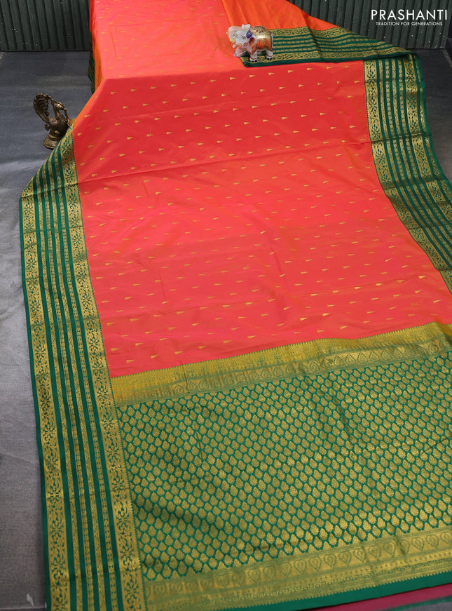 Semi kanchipuram silk saree orange and green with allover zari woven buttas and zari woven border