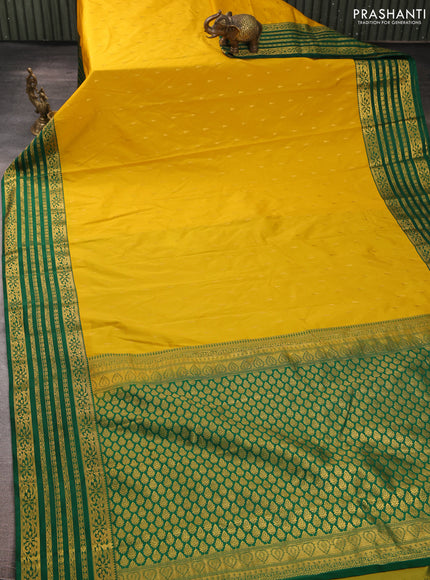 Semi kanchipuram silk saree yellow and green with allover zari woven buttas and zari woven border