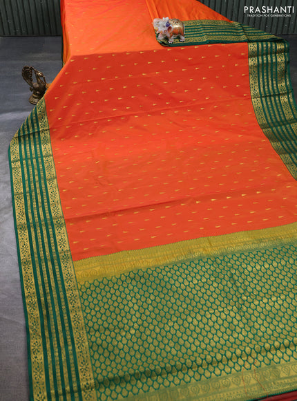 Semi kanchipuram silk saree orange and green with allover zari woven buttas and zari woven border