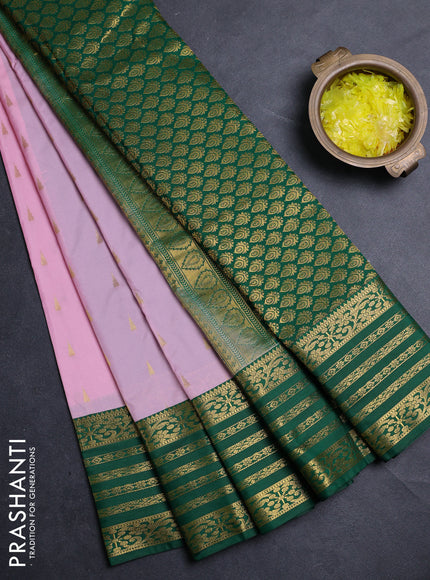 Semi kanchipuram silk saree peach pink and green with allover zari woven buttas and zari woven border