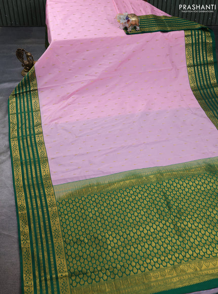 Semi kanchipuram silk saree peach pink and green with allover zari woven buttas and zari woven border