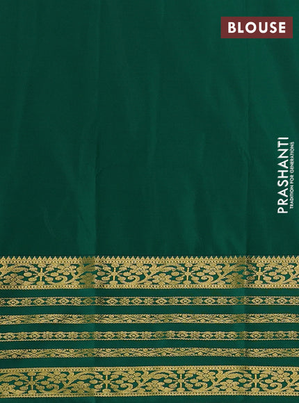 Semi kanchipuram silk saree peach pink and green with allover zari woven buttas and zari woven border