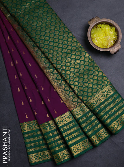 Semi kanchipuram silk saree magenta pink and green with allover temple zari woven buttas and zari woven border