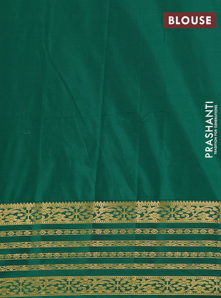Semi kanchipuram silk saree magenta pink and green with allover temple zari woven buttas and zari woven border