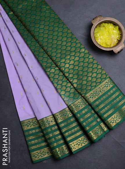 Semi kanchipuram silk saree lavender and green with allover temple zari woven buttas and zari woven border