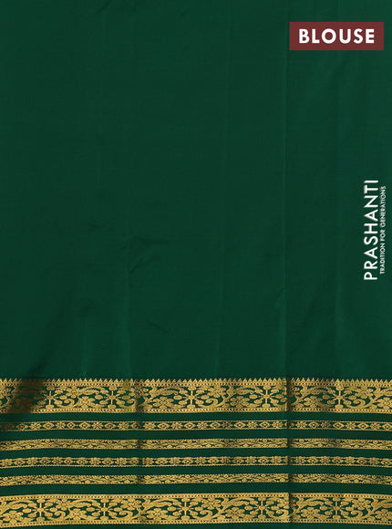 Semi kanchipuram silk saree lavender and green with allover temple zari woven buttas and zari woven border