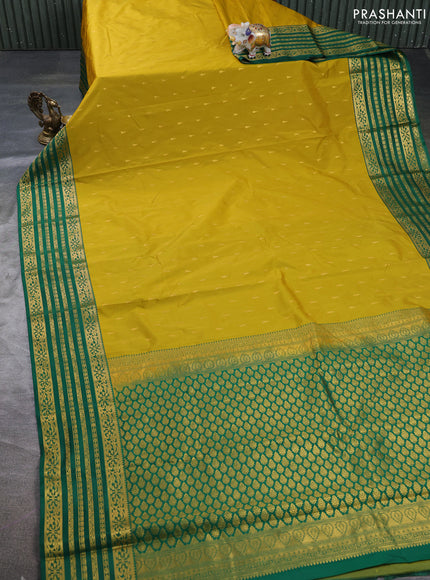 Semi kanchipuram silk saree mustard green and green with allover zari woven buttas and zari woven border