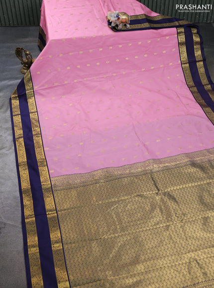 Semi kanchipuram silk saree peach pink and navy blue with allover zari woven buttas and rettapet zari woven border