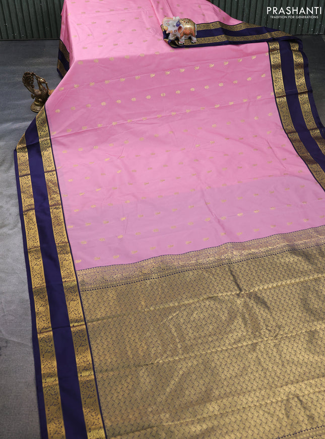 Semi kanchipuram silk saree peach pink and navy blue with allover zari woven buttas and rettapet zari woven border