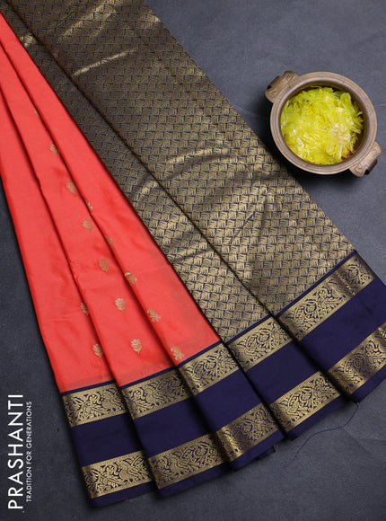 Semi kanchipuram silk saree peach orange and navy blue with allover zari woven buttas and rettapet zari woven border