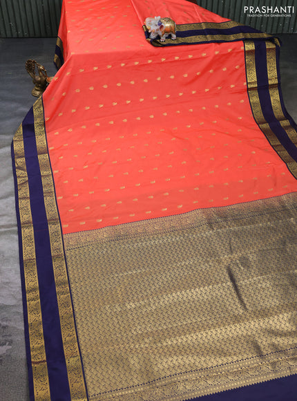 Semi kanchipuram silk saree peach orange and navy blue with allover zari woven buttas and rettapet zari woven border