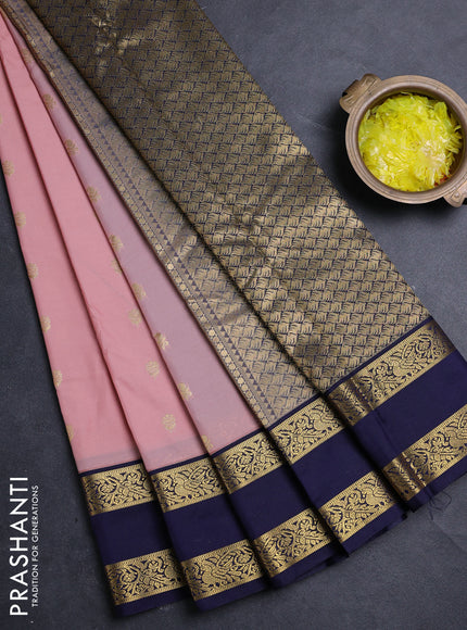 Semi kanchipuram silk saree pastel pink and navy blue with allover zari woven buttas and rettapet zari woven border