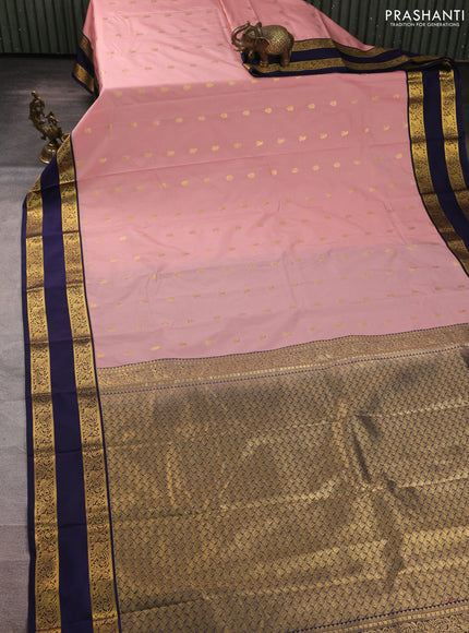 Semi kanchipuram silk saree pastel pink and navy blue with allover zari woven buttas and rettapet zari woven border