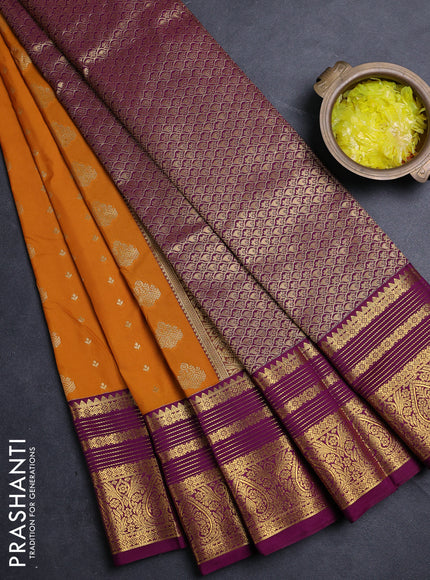 Semi kanchipuram silk saree mango yellow and purple with allover zari woven buttas and long zari woven border