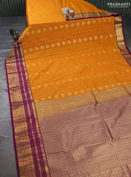 Semi kanchipuram silk saree mango yellow and purple with allover zari woven buttas and long zari woven border
