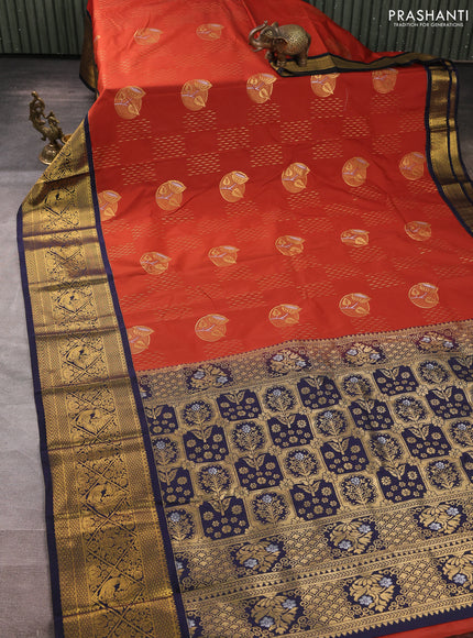 Semi kanchipuram silk saree rust shade and navy blue with zari woven buttas and zari woven border