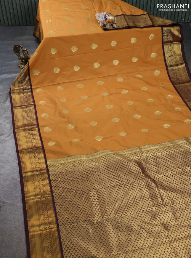 Semi kanchipuram silk saree mustard yellow and deep maroon with zari woven buttas and zari woven border
