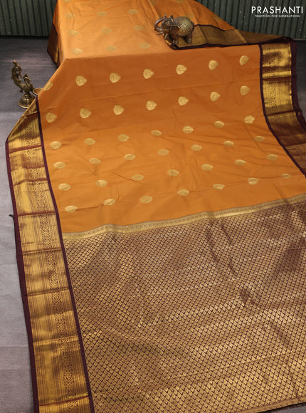 Semi kanchipuram silk saree mustard yellow and deep maroon with zari woven buttas and zari woven border