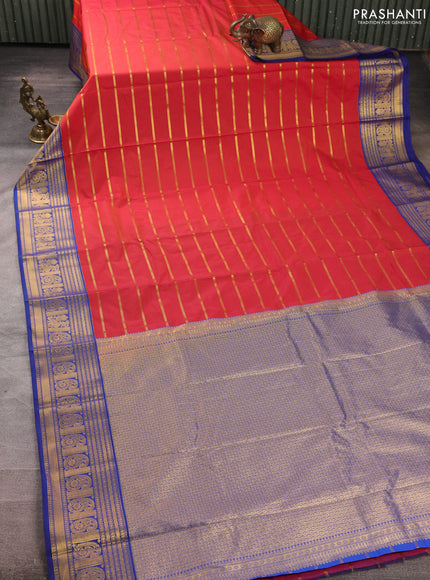 Semi kanchipuram silk saree tomato pink and blue with allover zari stripe pattern and zari woven border