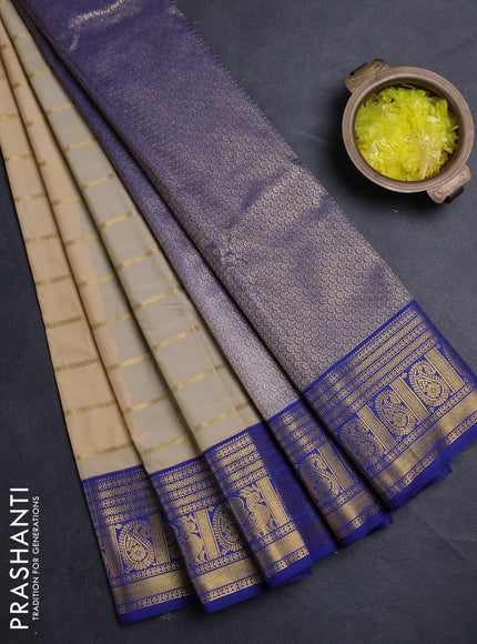Semi kanchipuram silk saree cream and blue with allover zari stripe pattern and zari woven border