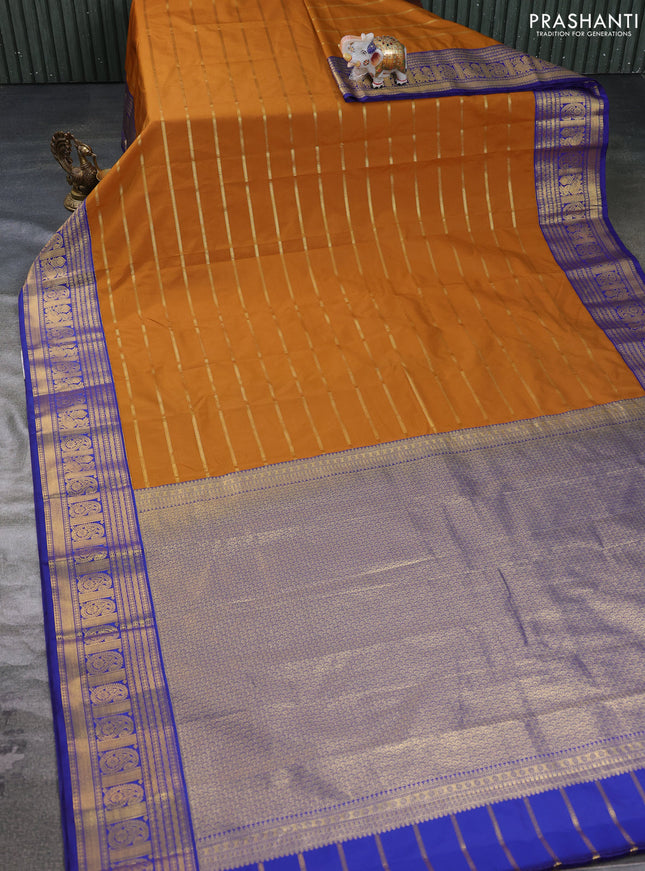 Semi kanchipuram silk saree mustard yellow and blue with allover zari stripe pattern and zari woven border