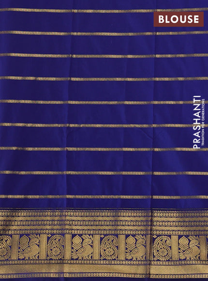 Semi kanchipuram silk saree mild peach pink and navy blue with allover zari stripe pattern and zari woven border