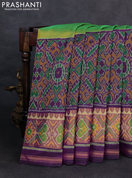 Rajkot patola silk saree mustard green and purple with plain body and ikat woven zari border