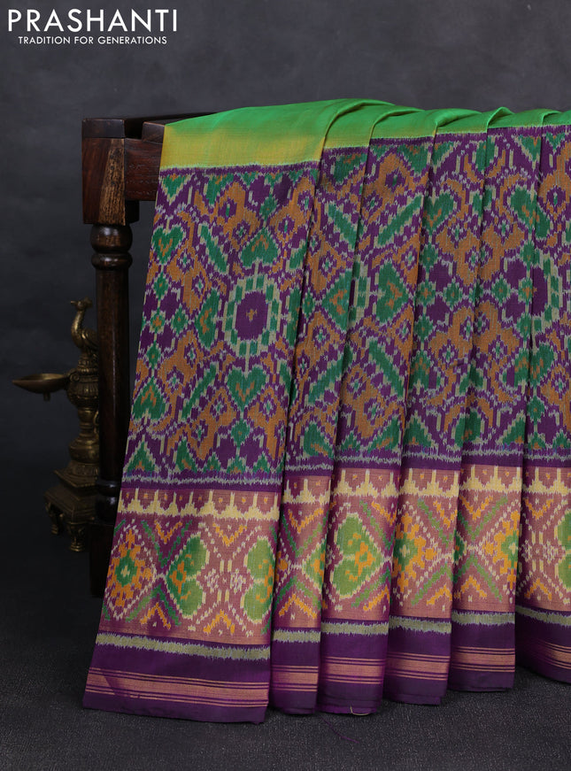 Rajkot patola silk saree mustard green and purple with plain body and ikat woven zari border