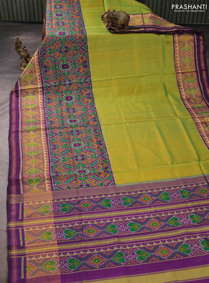 Rajkot patola silk saree mustard green and purple with plain body and ikat woven zari border