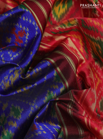 Rajkot patola silk saree blue and kumkum red with allover ikat weaves and ikat woven zari border