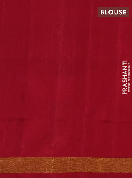 Rajkot patola silk saree blue and kumkum red with allover ikat weaves and ikat woven zari border