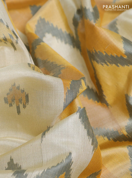 Rajkot patola silk saree cream and mustard yellow grey with allover ikat butta weaves and ganga jamuna border