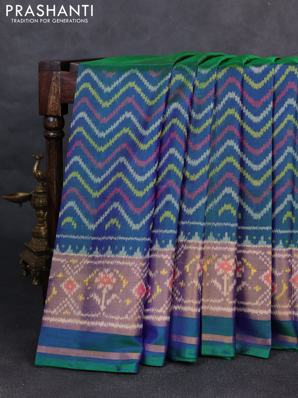 Rajkot patola silk saree purple and dual shade of bluish green with allover ikat butta weaves and ikat woven zari border