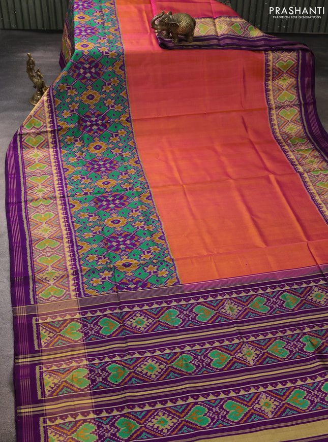 Rajkot patola silk saree dual shade of pinkish yellow and purple with plain body and ikat woven zari border