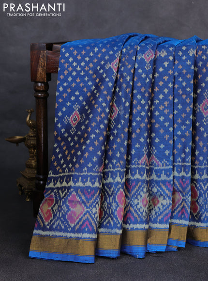 Rajkot patola silk saree cs blue with allover ikat weaves and ikat woven zari border