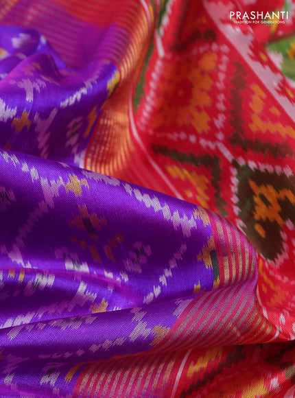 Rajkot patola silk saree purple and kumkum red with allover ikat weaves and ikat woven zari border