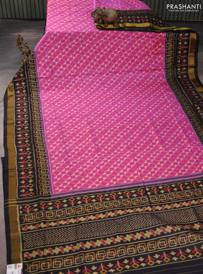 Rajkot patola silk saree pink and black with allover ikat weaves and ikat woven zari border