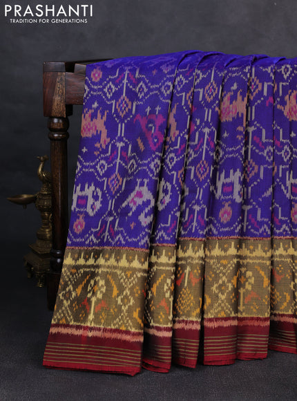 Rajkot patola silk saree blue and deep maroon with allover ikat weaves and ikat woven zari border