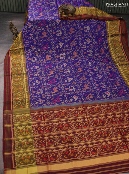 Rajkot patola silk saree blue and deep maroon with allover ikat weaves and ikat woven zari border