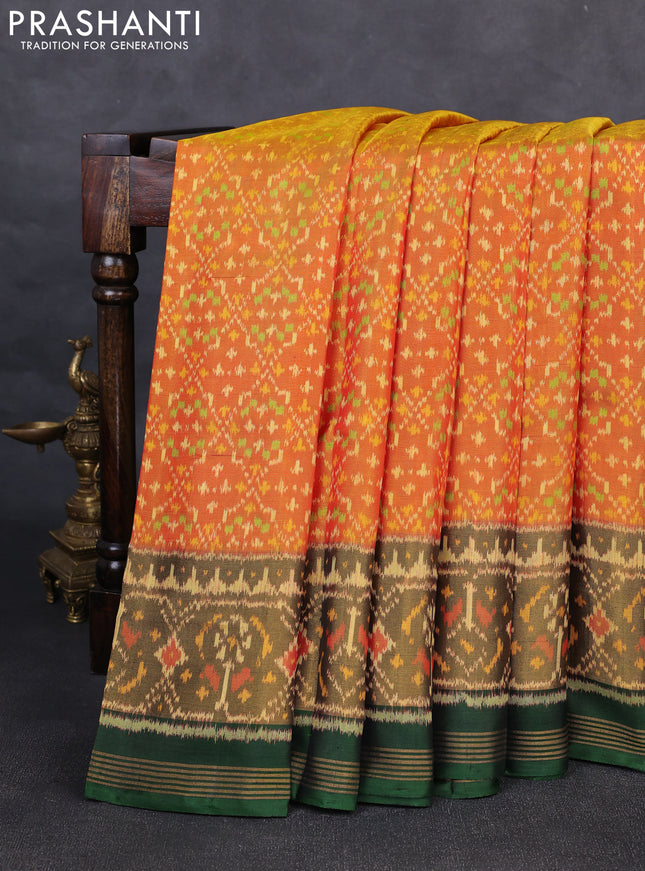 Rajkot patola silk saree dual shade of sunset orange and bottle green with allover ikat weaves and zari woven ikat border