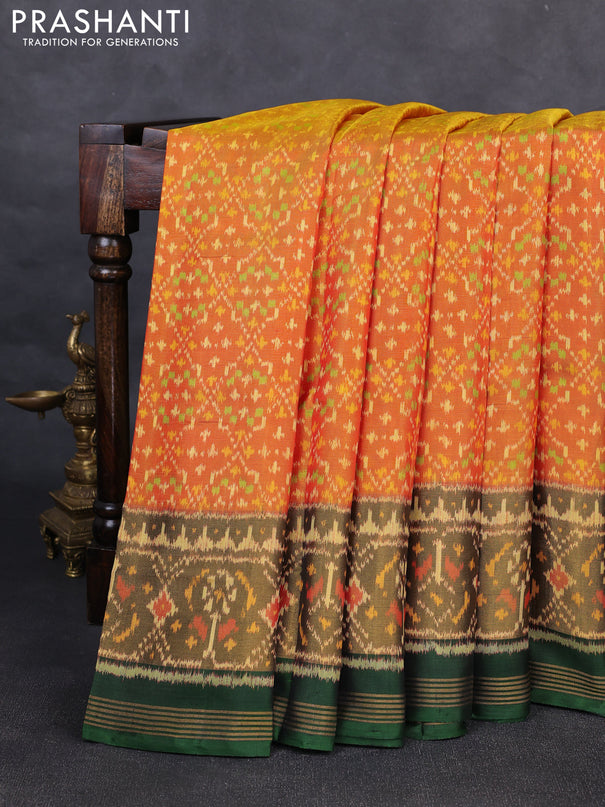 Rajkot patola silk saree dual shade of sunset orange and bottle green with allover ikat weaves and zari woven ikat border