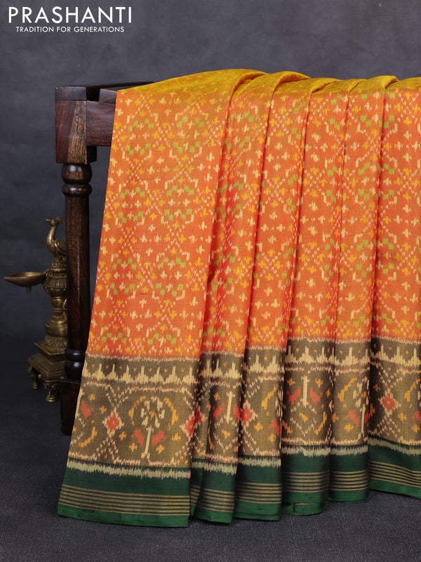 Rajkot patola silk saree dual shade of sunset orange and bottle green with allover ikat weaves and zari woven ikat border