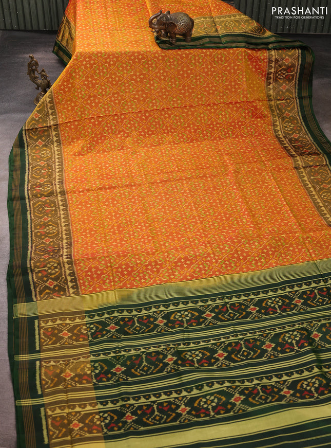 Rajkot patola silk saree dual shade of sunset orange and bottle green with allover ikat weaves and zari woven ikat border