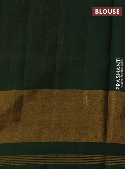 Rajkot patola silk saree dual shade of sunset orange and bottle green with allover ikat weaves and zari woven ikat border