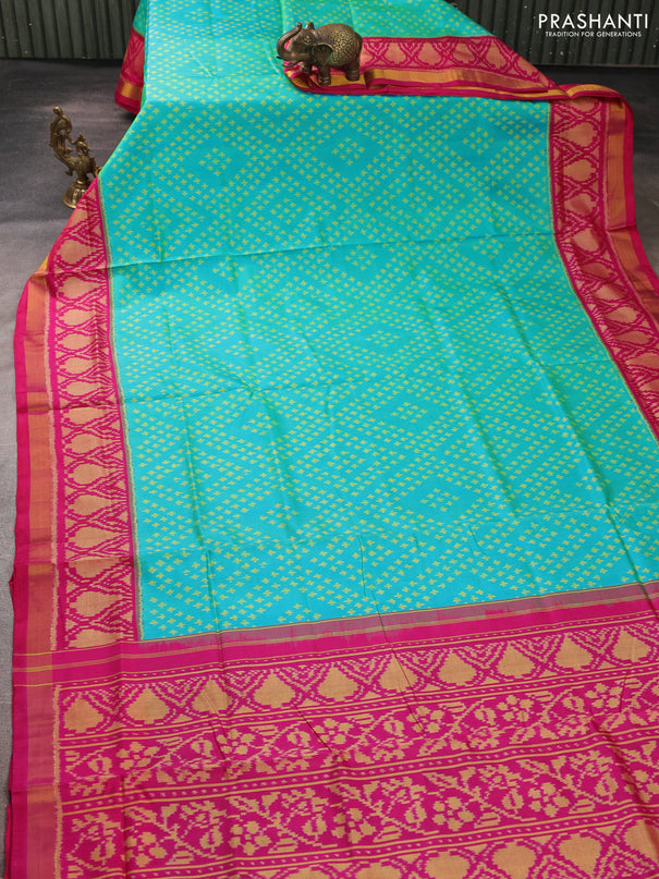 Rajkot patola silk saree teal green and pink with allover ikat weaves and ikat woven zari border